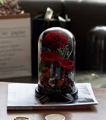 Preserved flower in glass dome