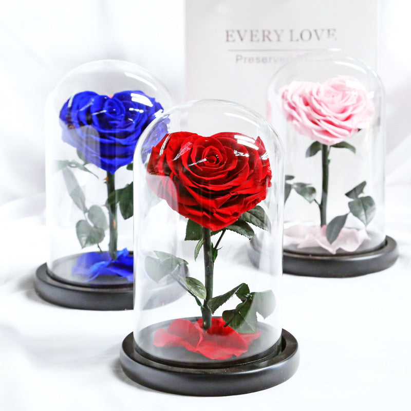 Heart-shaped eternal flowers in a small prince glass-covered gift  preserved flowers with glass dome