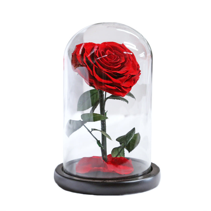 Heart-shaped eternal flowers in a small prince glass-covered gift  preserved flowers with glass dome