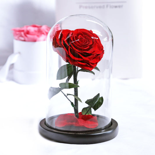 Heart-shaped eternal flowers in a small prince glass-covered gift  preserved flowers with glass dome