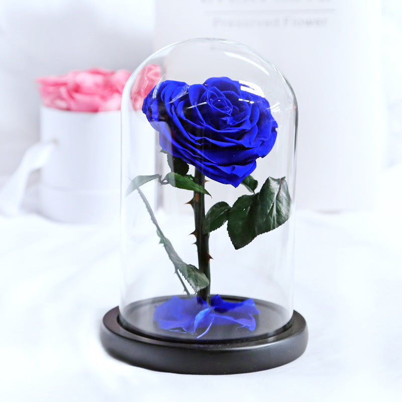 Heart-shaped eternal flowers in a small prince glass-covered gift  preserved flowers with glass dome