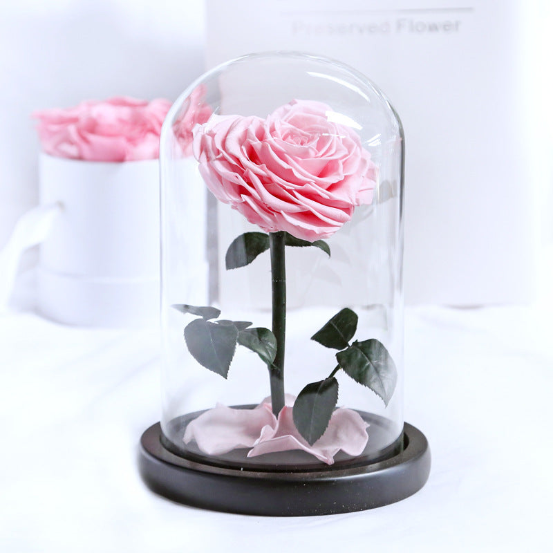 Heart-shaped eternal flowers in a small prince glass-covered gift  preserved flowers with glass dome